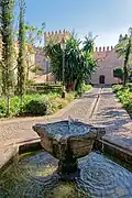 Fountain from the Andalusian Gardens with one of the walls in the back