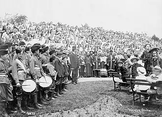 Crowd at the unveiling, including several Mi'kmaq in traditional dress.