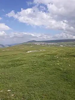 green grass and sky and clouds