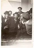 Rabbi Steinman with students of Little Yeshiva Ponevezh on Purim, 1960