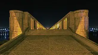 Si-o-se-pol's walkway at night.