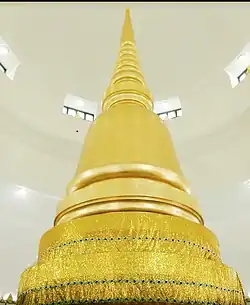 Inside the great stupa, a smaller golden stupa containing the relics of the Buddha