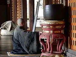 Buddhist monk seated in Seiza. Hōkō-ji temple, Japan
