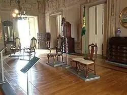 The throne room, on display in preserved rooms in the front wings of the museum