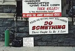 Banner calling for the Jonny Gammage case to be reopened