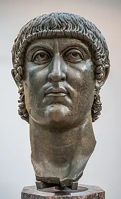 Head of a round faced man