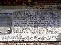 A replica, sculpted in 1457, of the ancient plaque commemorating the election of Lamberto Artusini in 1287. It stands along the facade of the Palazzo di re Enzo in Piazza Maggiore square in Bologna, Italy. Source: Giovanni Dall’Orto