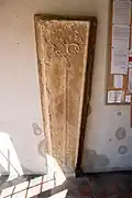 14th-century coffin lid in the south porch of the church
