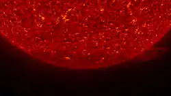 The Sun's South Pole. Material can be seen erupting from the Sun in the lower right side of the image. March 2007