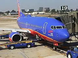 N248WN 737-700 (2000th Next Gen) at SNA Gate 19. Friday, October 13, 2017