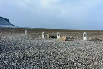 The four graves at Franklin Camp near the harbour on Beechey Island, Nunavut, Canada
