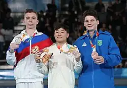 All-around victory ceremony (from left to right): Sergei Naidin (Silver), Takeru Kitazono (Gold), Diogo Soares (Bronze)