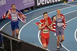 Photo of Jakob Ingebrigtsen, Neil Gourley, and Luke Houser after finishing a 1500 m race