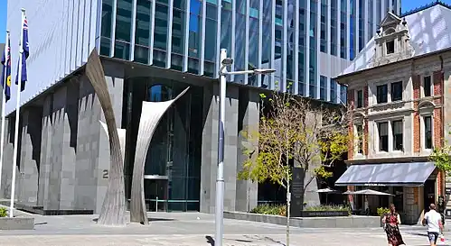 With state buildings to the south