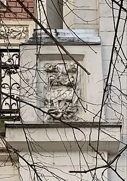 Art Nouveau cartouche on the Alexandru Gr. Ionescu House (Bulevardul Lascăr Catargiu no. 4), Bucharest, by Eduard Romantxo, 1898[13]