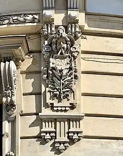 Beaux Arts mascaron in a small arabesque on the facade of Strada Clopotarii Vechi no. 4, Bucharest, Romania, unknown architect, 1899-1900