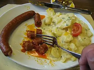 Swiss cuisine&nbsp;– paprika sausage with potatoes at the Zeughauskeller, Zürich, Switzerland