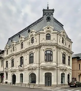 Mixed with Beaux-Arts architecture - Mița the Cyclist House in Bucharest by Nicolae C. Mihăescu (1908), mix of Beaux Arts and Art Nouveau[103]
