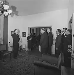 Photograph of a delegation (including L. A. Puntila [fi]) visiting professor A. I. Virtanen on his 70th birthday in 1965