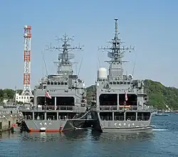 JS Tenryū and JS&nbsp;Kurobe at Kure on 15 April 2016.