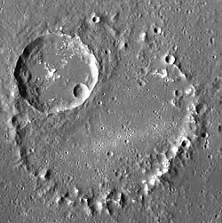 The central peak ring. The bright patches are hollows.