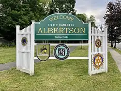 An Albertson welcome sign at Reflection Park