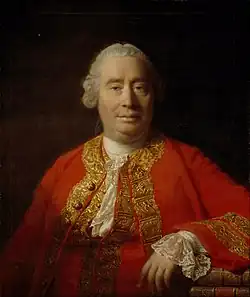 Oil painting showing David Hume from the front against a dark background, dressed in a red coat with gold embroidery, his left arm resting on a surface