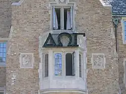 The Greek letters spelling "DOG", the symbol of the Hall