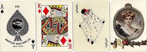 Ace of Spades, King of Diamonds, Joker, and reverse design from a deck of playing cards.