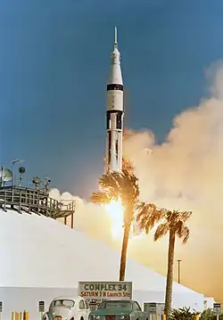 Apollo 7 launch, photographed from behind the blockhouse