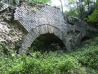 Arch of the aqueduct at Saint Maurice sur Dargoire showing opus reticulatum