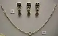Chain and three necklace pendants from the treasure (BM)