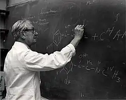 Julius Axelrod working at the blackboard on the structure of catecholamines