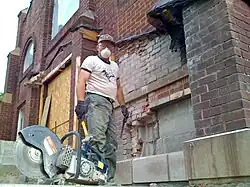Man doing brick repair