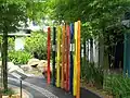 Musical pipes can be played by visitors in the sensory garden at the Building and Construction Authority Gallery, Singapore, which showcases the broad accessibility principles of Universal Design.[17]
