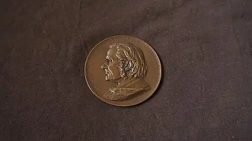 The Huxley memorial medallion in bronze created by Frank Boucher