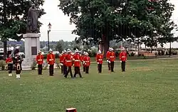 The Royal New Brunswick Regiment's full dress uniform includes a Wolseley helmet with a blue puggaree.
