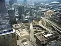 Aerial view from Bank of America Plaza's 46th floor; downtown Atlanta in upper left of photo; I-75/I-85 (the Connector) is the major road artery running under the bridges and near the edges of Baltimore Block at bottom right corner