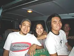 Drummer Wendell Garcia, vocalist Barbie Almalbis, and guitarist Kakoi Legaspi after Barbie's Cradle's performance at the 2005 Febfair at UP Los Baños.