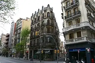 Casa Jaume Estrada (1906) on the neighbourhood's main artery, Carrer de Sants