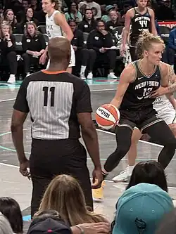 Image 9A basketball referee watches players closely during the WNBA Finals. (from Official (basketball))