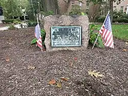 Photo shows an historical marker at the Lutheran Theological Seminary at 7301 Germantown Ave, Philadelphia, PA 19119. The marker reads, "On this spot at dawn on the fourth day of October Seventeen Hundred Seventy Seven the American troops under General Washington attacked the British troops thus beginning the Battle of Germantown. Erected by the class of 1919."