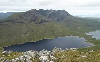 Full ridge of Ben Lugmore and Lug More corrie, viewed from across Doo Lough, on Barrclashcame