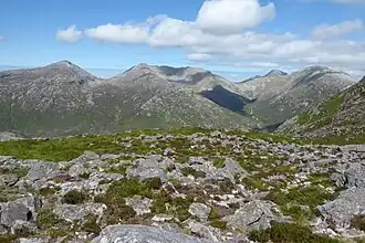 Bengower (left), Benbreen (centre), and Bencollaghduff (right), viewed Derryclare
