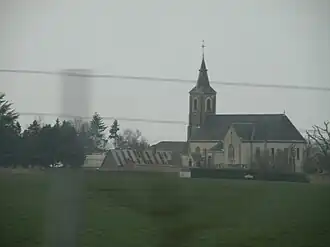 The church and surroundings in Blandainville