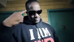 Screenshot of Blaq Poet from music video "Catch My Drift" by Ruc featuring Blaq Poet