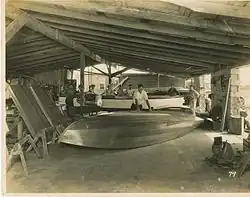 Bill Farley building a speedboat at Farley and Son, Boat Builders