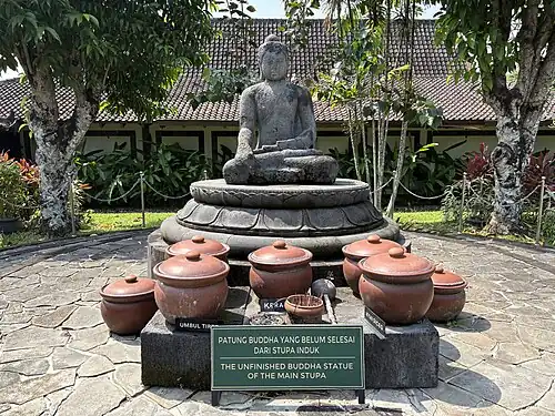 The Unfinished Buddha's display as of 2025; the chhatra was relocated elsewhere.