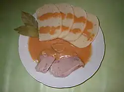 Pork with Milanese sauce and yeast dumplings