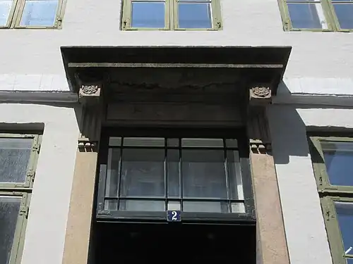 Detail of the transom window above the main entrance